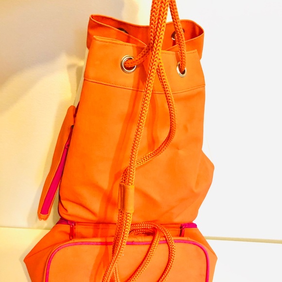 Backpack &. Cooler in one with matching wristlet!